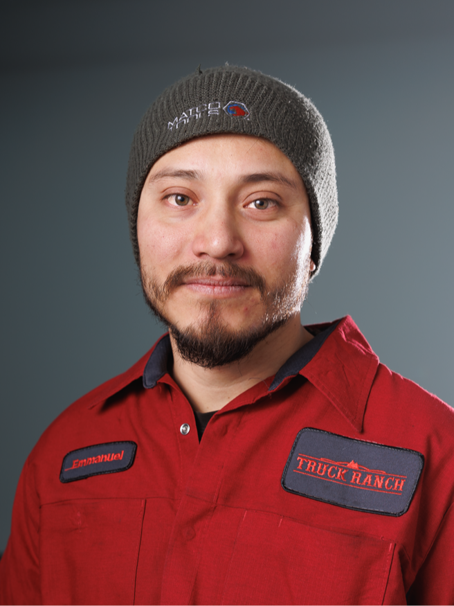 Service Technician Emmanuel Morales in Truck Ranch Garage at Truck Ranch